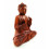 Sculpture Buddha Shakyamuni seated in a wood. Buddha Statue In Bali.