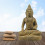Statua di Buddha Bhumisparsha seduto in pietra 30cm